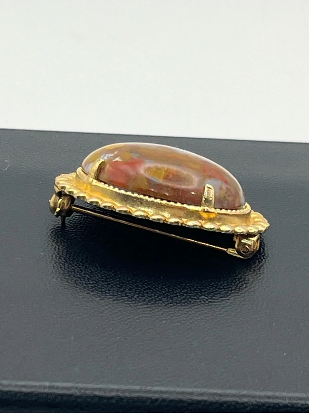 Orange red oval faux stone beaded scalloped edge gold tone vintage brooch pin